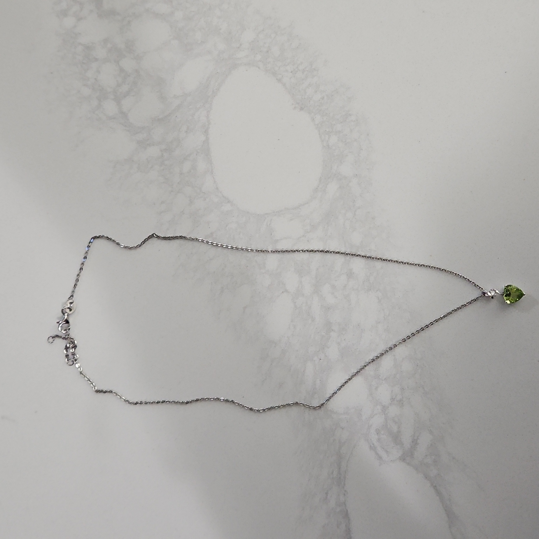 Heart Shaped Peridot Birthstone Necklace With Small Diamond